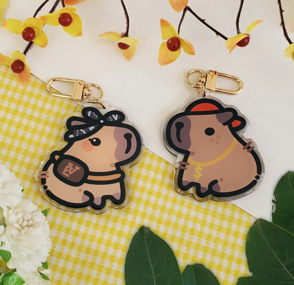 LOOKING FOR:HELLO KITTY AND CAPYBARA KAPYBARA CHARM/PENDENT/KEYCHAIN/STRAP,  Looking For on Carousell